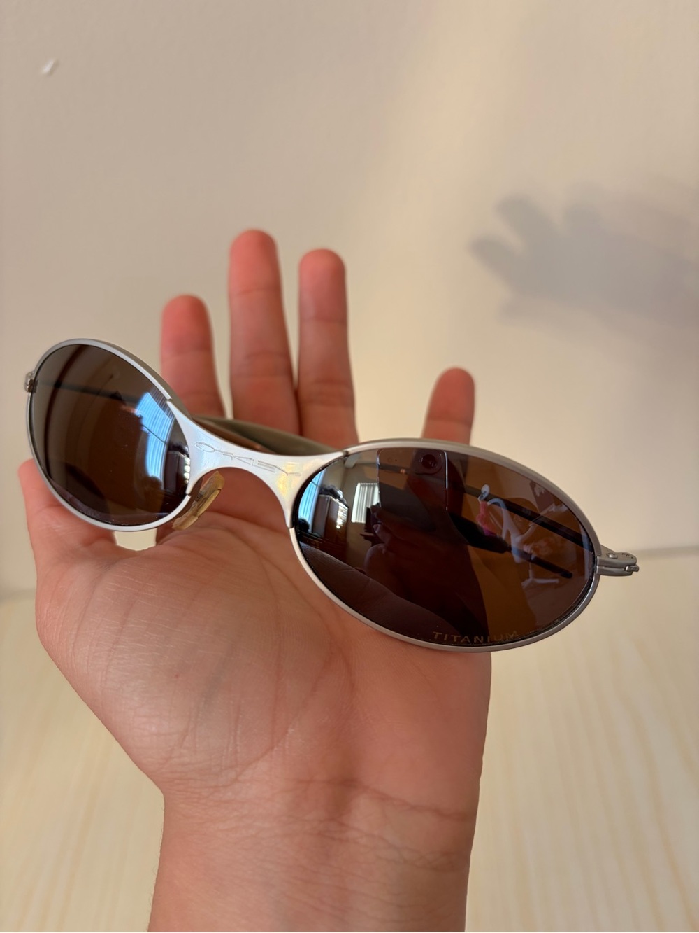 Vintage Oakley Silver Titanium Oval Sunglasses with Brown Lenses